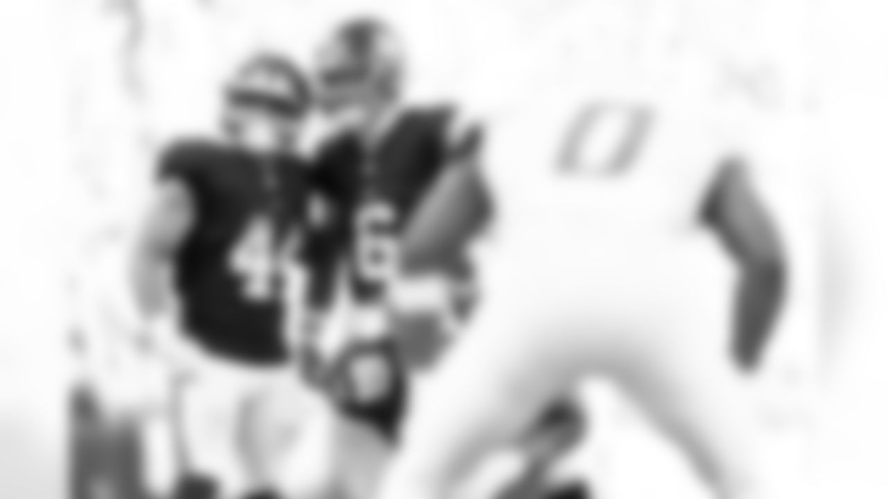 RB Cam Skattebo (44), QB Jaxson Dart (6)