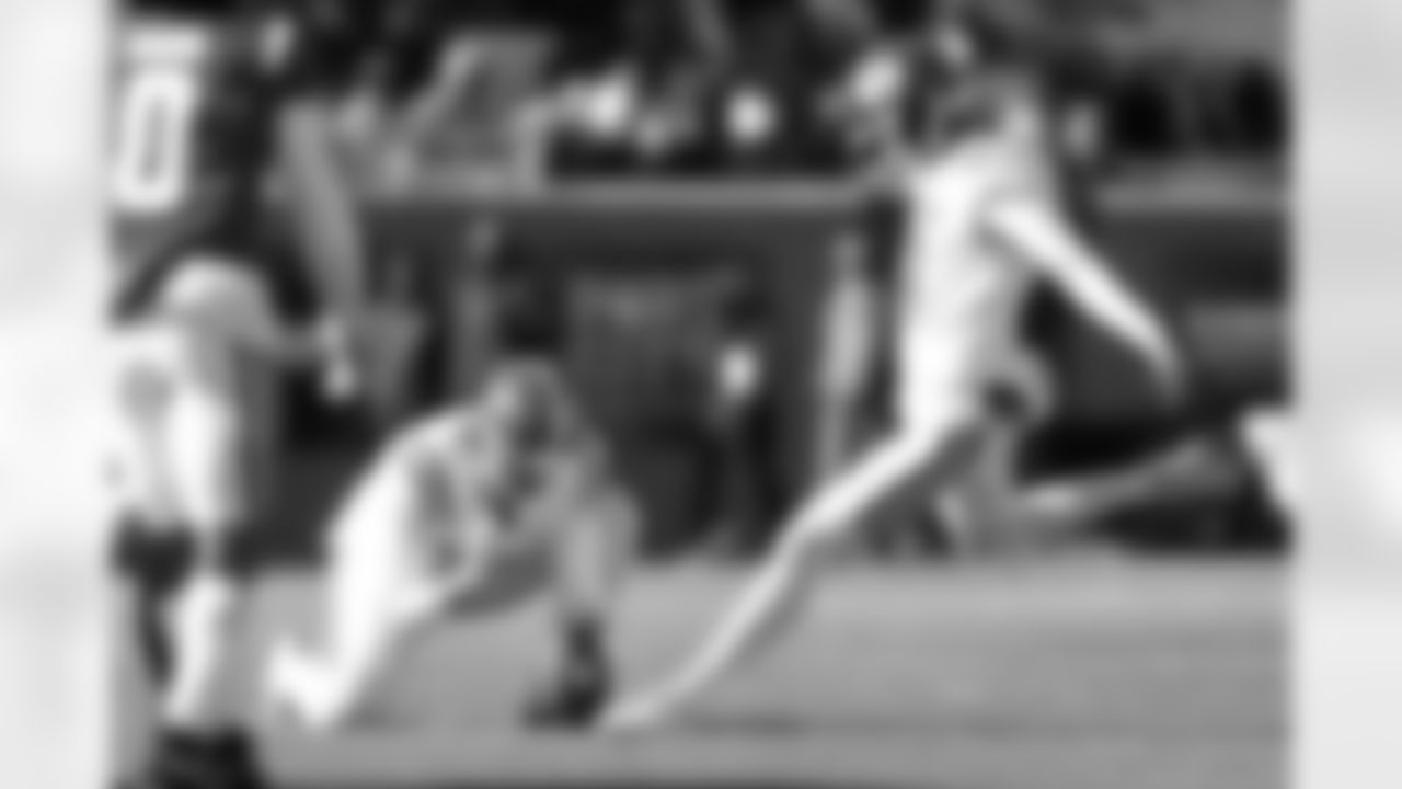 American Team kicker William Ferrin (14), of Brigham Young, kicks a field goal while punter Brett Thorson (6), of Georgia, holds during the first half of the Senior Bowl NCAA college football game Saturday, Jan. 31, 2026, in Mobile, Ala. (AP Photo/Butch Dill)