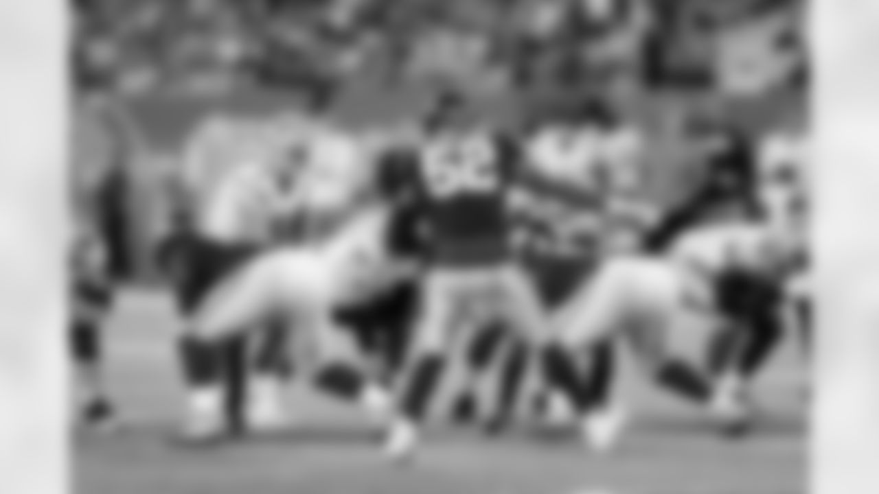 New York Giants outside linebacker Jonathan Casillas (52) points during the 2017 NFL week 2 regular season football game against the against the Detroit Lions, Monday, Sept. 18, 2017 in East Rutherford, N.J. The Lions won the game 24-10. (Paul Spinelli via AP)