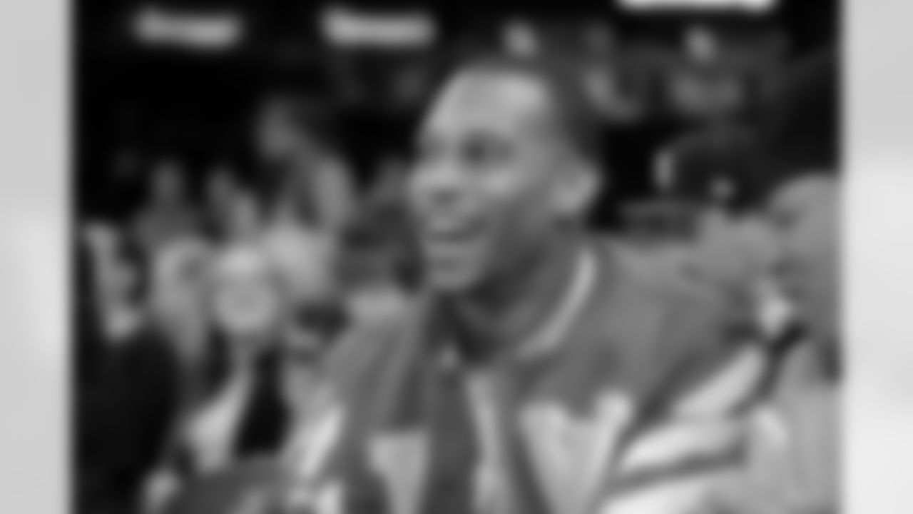 New York Giants wide receiver Victor Cruz watches the New York Knicks and Toronto Raptors play during the fourth quarter of an NBA basketball game Monday, Feb. 22, 2016, at Madison Square Garden in New York. The Raptors won 122-95. (AP Photo/Bill Kostroun)