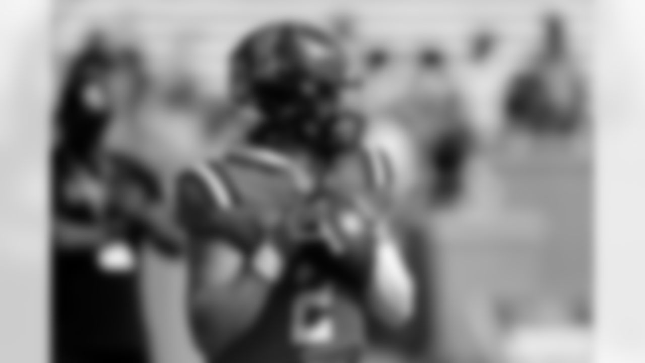 American team quarterback Jaxson Dart (2), of Mississippi, during warmups for the Senior Bowl NCAA college football game, Saturday, Feb. 1, 2025, in Mobile, Ala. (AP Photo/Butch Dill)