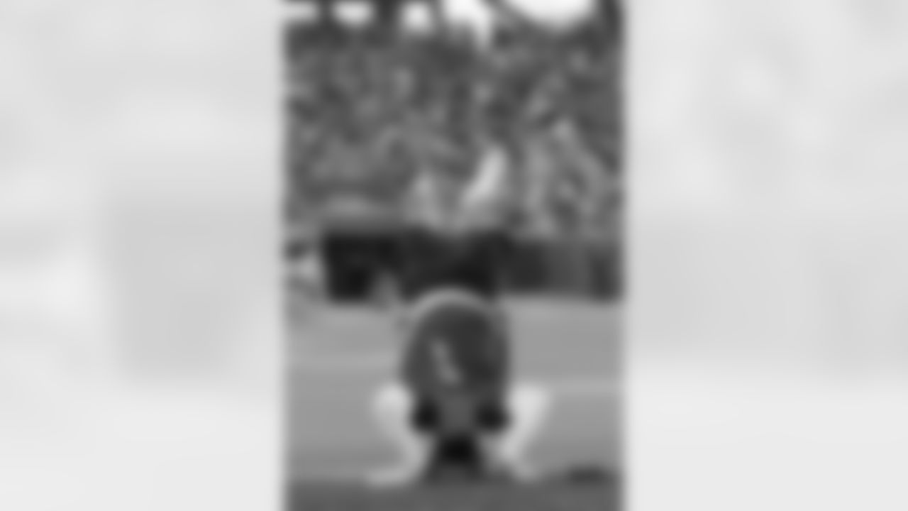 NFC wide receiver Malik Nabers (1) of the New York Giants celebrates during the NFL Pro Bowl football game, Sunday, Feb. 2, 2025, in Orlando, Fla. (Perry Knotts via AP)