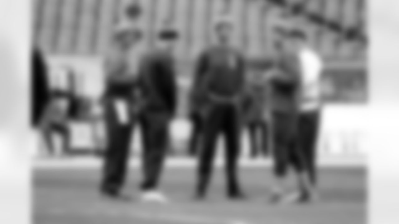 Tampa Bay Buccaneers and Chicago Bears quarterbacks from left, the Buccaneers' Mike Kafka, Bears' Jay Cutler, the Buccaneers' Mike Glennon, the Buccaneers' Josh McCown, and the Bears' Jimmy Clausen gather before an NFL football game Sunday, Nov. 23, 2014, in Chicago. (AP Photo/Nam Y. Huh)
