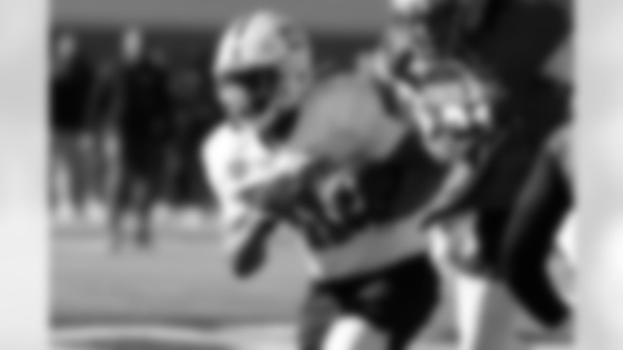 National Team running back Kaytron Allen (11), of Penn State, runs through drills during practice for the Senior Bowl NCAA college football game Tuesday, Jan. 27, 2026, in Mobile, Ala. (AP Photo/Butch Dill)