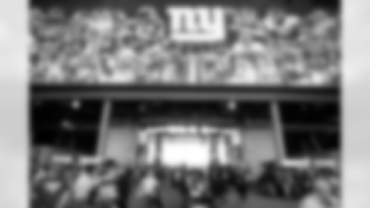 New York Giants arrive before an NFL football game between the Detroit Lions and the New York Giants at New Meadowlands Stadium Sunday, Oct. 17, 2010, in East Rutherford, N.J. (AP Photo/Tim Larsen)