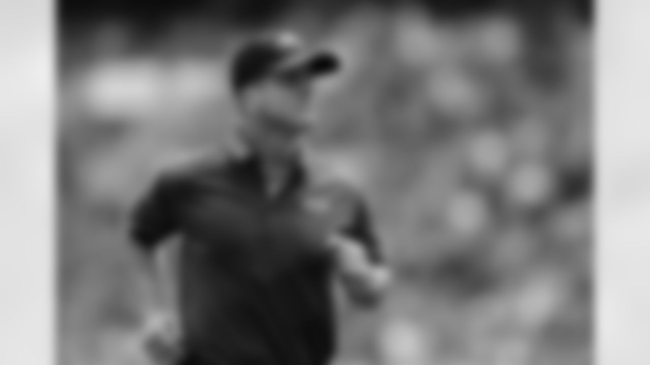 Baltimore Ravens head coach John Harbaugh runs from the field before an NFL football game against the Jacksonville Jaguars at Wembley Stadium in London, Sunday Sept. 24, 2017. (AP Photo/Matt Dunham)