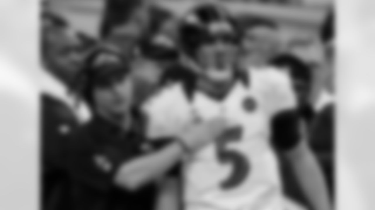 Baltimore Ravens head coach John Harbaugh talks with quarterback Joe Flacco (5) after the Ravens scored a touchdown against the San Francisco 49ers during the first half of the NFL Super Bowl XLVII football game, Sunday, Feb. 3, 2013, in New Orleans. (AP Photo/Gene Puskar)