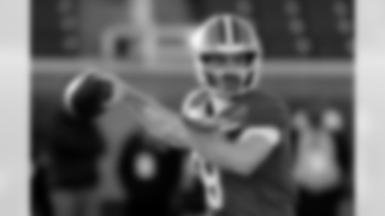 American Team quarterback Luke Altmyer (9), of Illinois, runs through drills during practice for the Senior Bowl NCAA college football game Tuesday, Jan. 27, 2026, in Mobile, Ala. (AP Photo/Butch Dill)