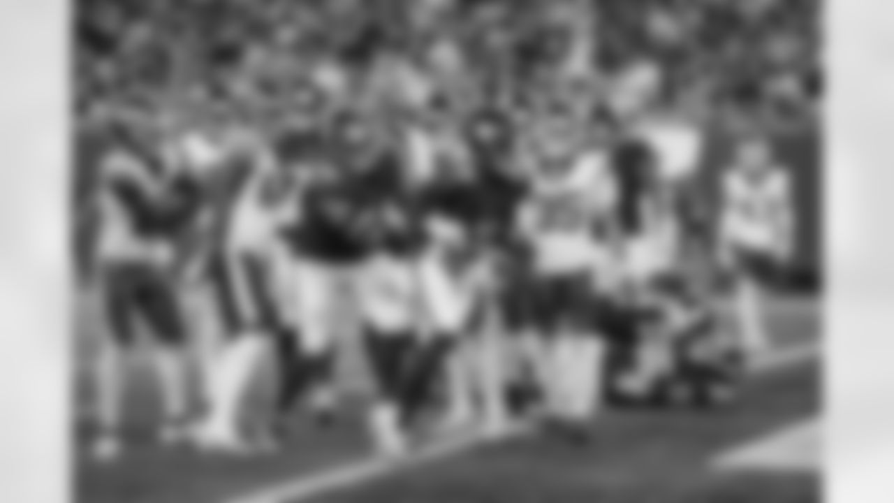 QB Jameis Winston (19), G Aaron Stinnie (64)