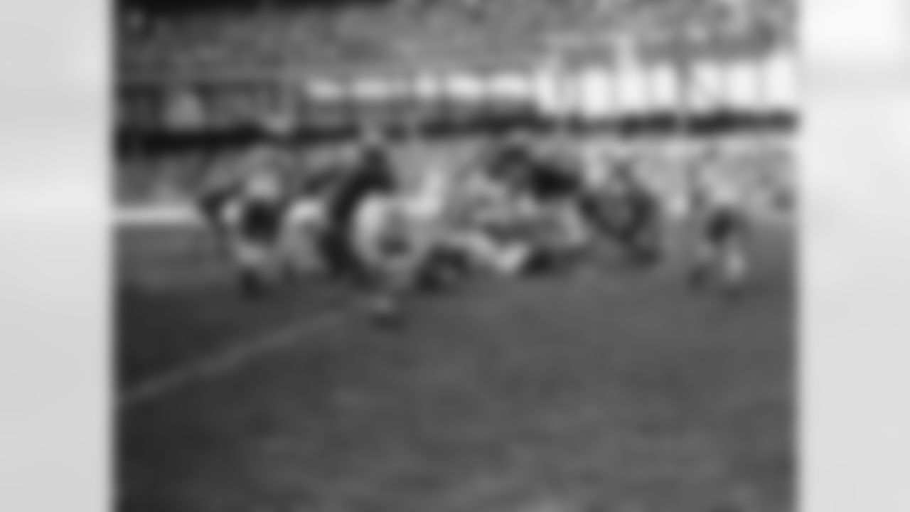 Detroit Lions fullback Ace Gutowsky hurdles over New York Giants line for 9 yard gain in game on Nov. 1, 1936 at the Polo Grounds. The Giants won, 14-7. (AP Photo)