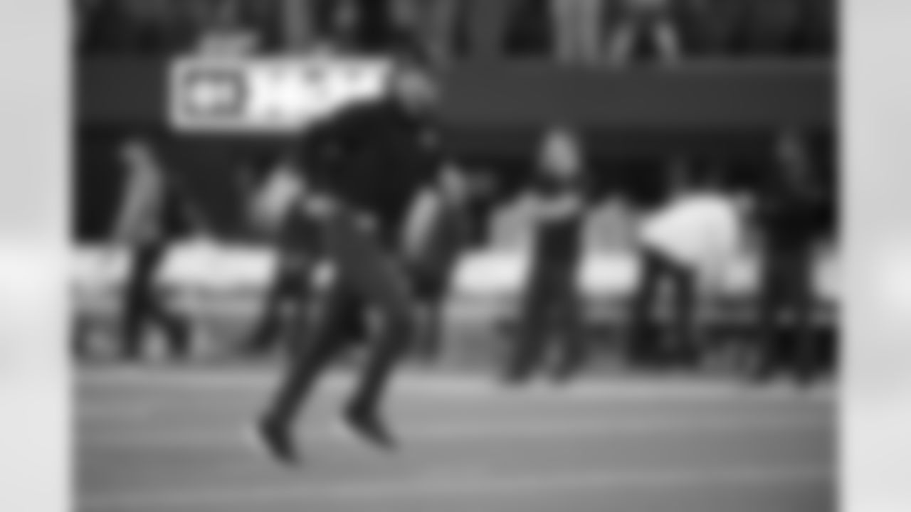 Baltimore Ravens head coach John Harbaugh runs before an NFL football game against the Los Angeles Chargers, Sunday, Nov. 26, 2023, in Inglewood, Calif. (AP Photo/Kyusung Gong)