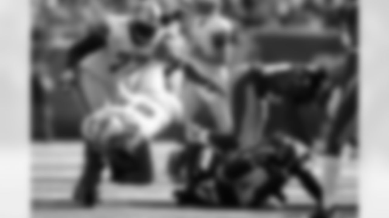 Detroit Lions fullback Jerome Felton (45) rushes during the first quarter of an NFL football game between the Detroit Lions and the New York Giants at New Meadowlands Stadium Sunday, Oct. 17, 2010, in East Rutherford, N.J. (AP Photo/Tim Larsen)