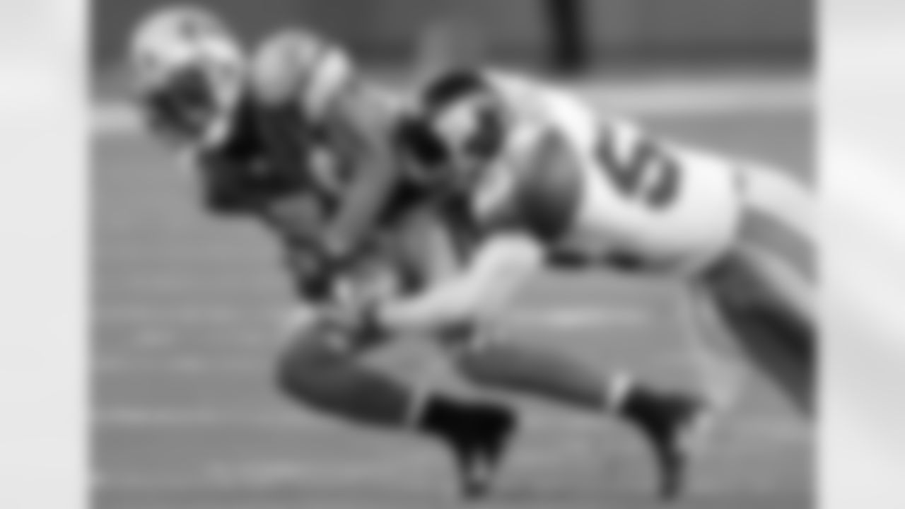 Detroit Lions wide receiver Shaun McDonald (84) fumbles after being hit by New York Giants linebacker Antonio Pierce in the second quarter of an NFL football game in Detroit, Sunday, Nov. 18, 2007. New York recovered the fumble. (AP Photo/Paul Sancya)