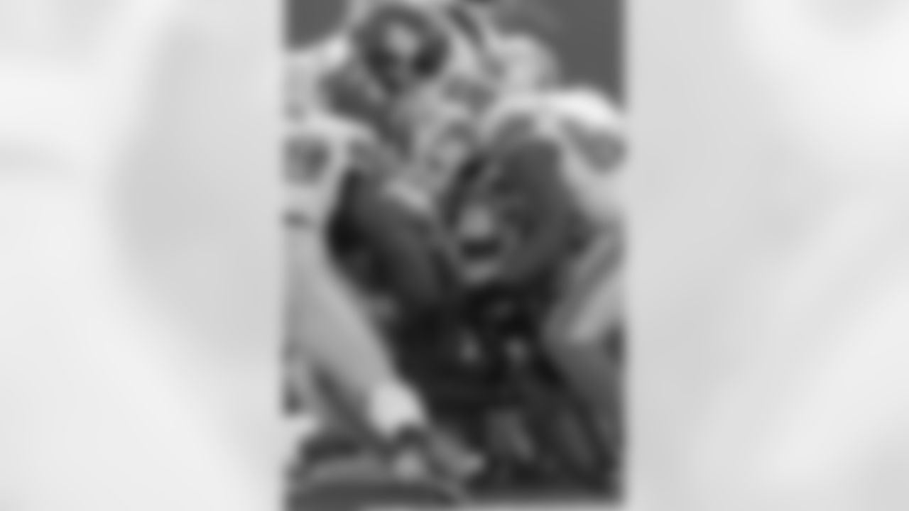 New York Giants running back Ahmad Bradshaw (44) is tackled by the Detroit Lions during the second quarter of an NFL football game at New Meadowlands Stadium Sunday, Oct. 17, 2010, in East Rutherford, N.J. (AP Photo/Seth Wenig)