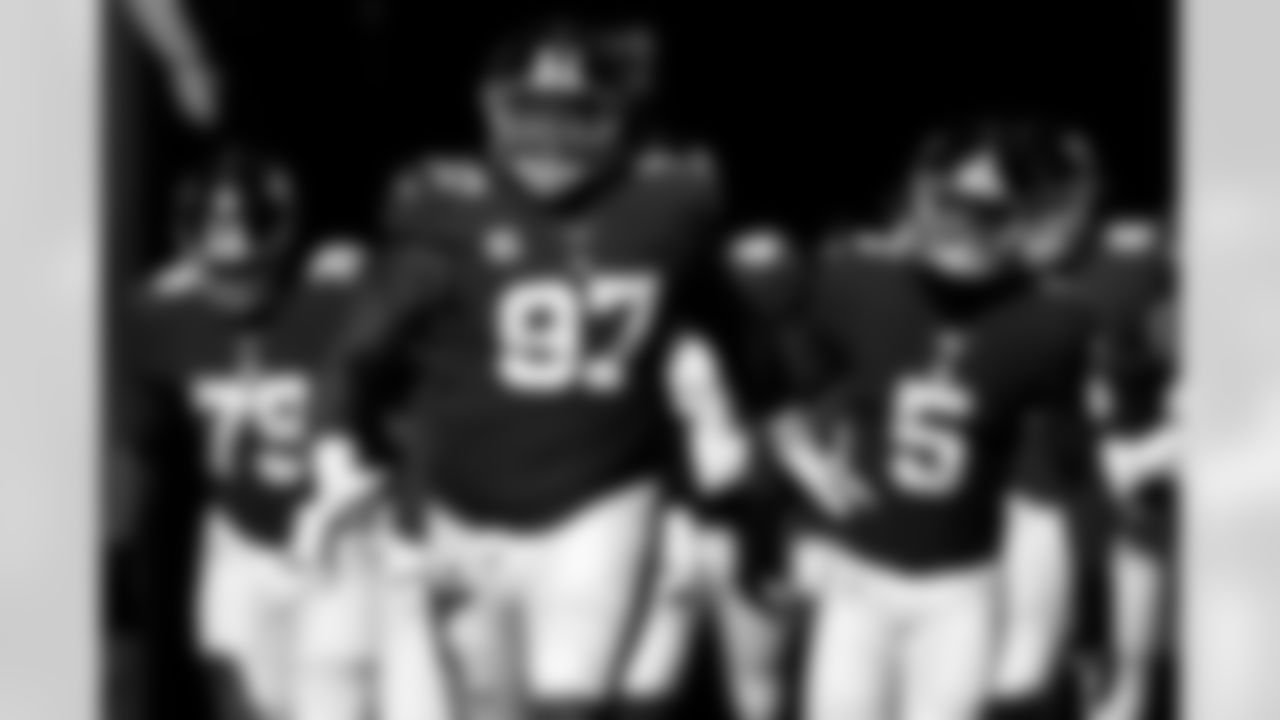 New York Giants defensive tackle Dexter Lawrence (97) takes the field to face the Detroit Lions in an NFL football game Sunday, Nov. 20, 2022, in East Rutherford, N.J. (AP Photo/Adam Hunger)