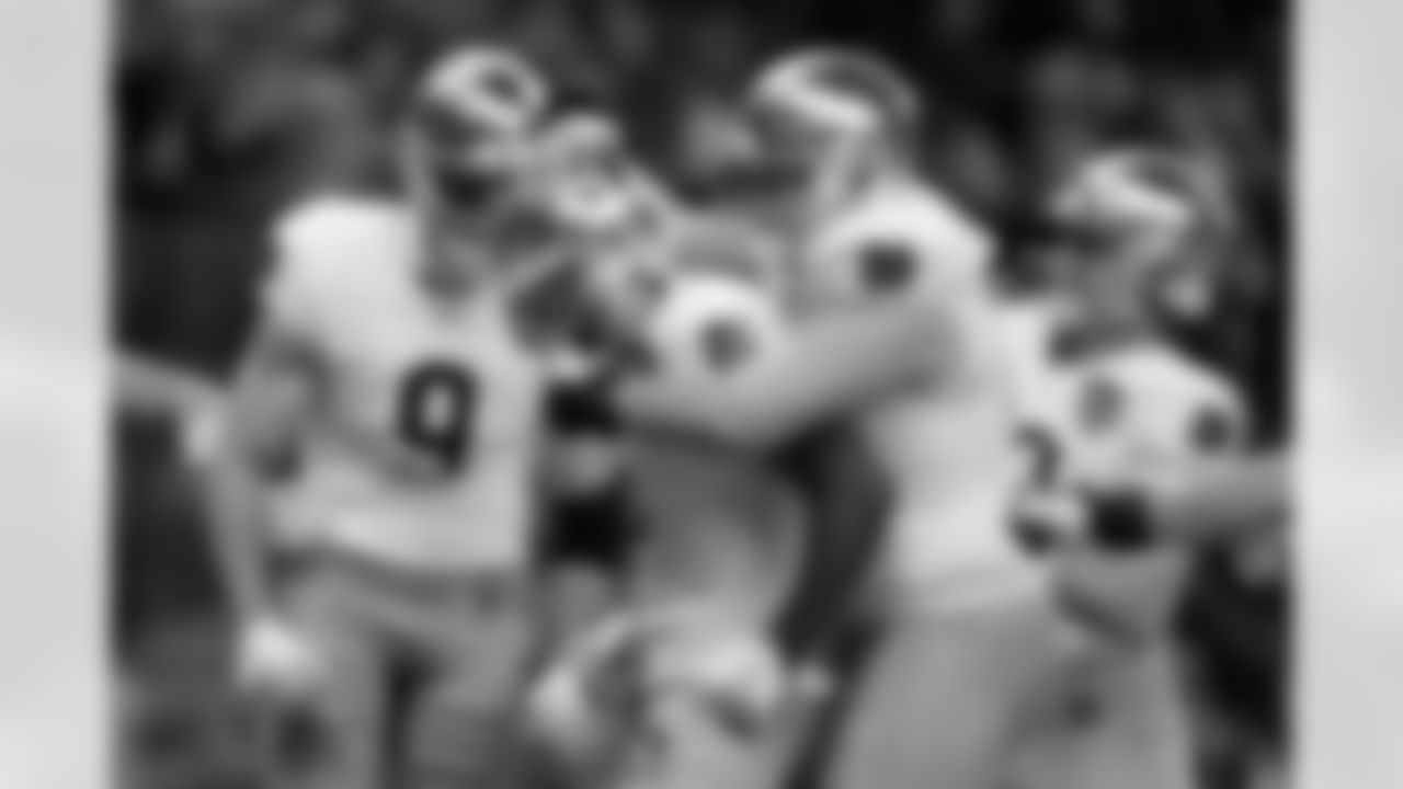 Notre Dame wide receiver Beaux Collins, center, celebrates with teammates after catching a 13-yard touchdown pass during the first half against Georgia in the quarterfinals of a College Football Playoff, Thursday, Jan. 2, 2025, in New Orleans. (AP Photo/Gerald Herbert)