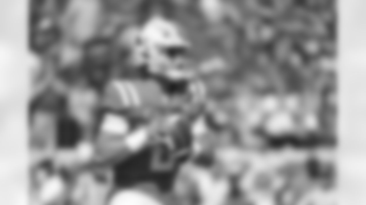 Mississippi quarterback Jaxson Dart (2) looks to pass during the first half of an NCAA college football game against Kentucky in Oxford, Miss., Saturday, Oct. 1, 2022. (AP Photo/Thomas Graning)