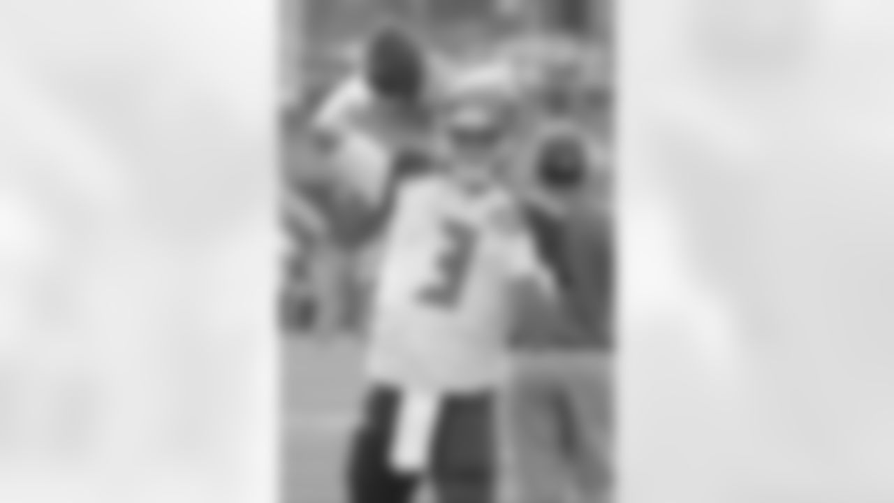 Tampa Bay Buccaneers quarterback Mike Kafka (3) warms up before the NFL football game against the Pittsburgh Steelers on Sunday, Sept. 28, 2014 in Pittsburgh. (AP Photo/Don Wright)