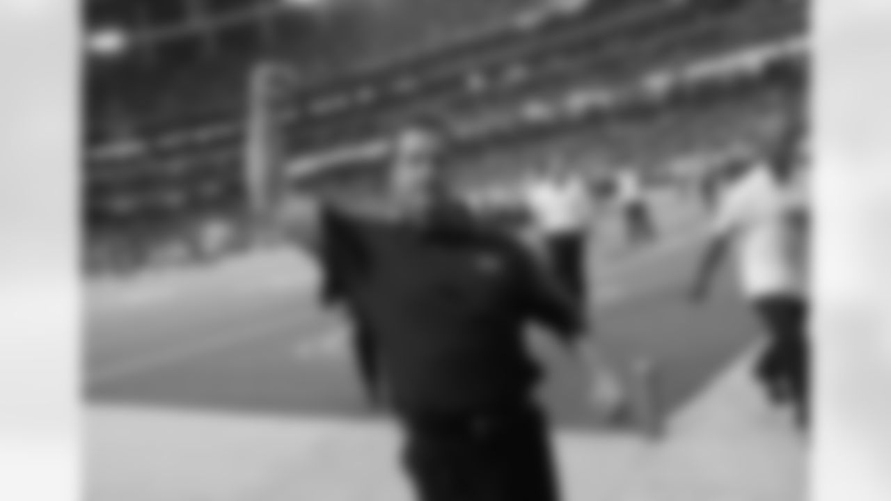 Baltimore Ravens head coach John Harbaugh walks off the field following warm ups before an NFL football game against the Atlanta Falcons, Thursday, Nov. 11, 2010, in Atlanta.  (AP Photo/David Goldman)