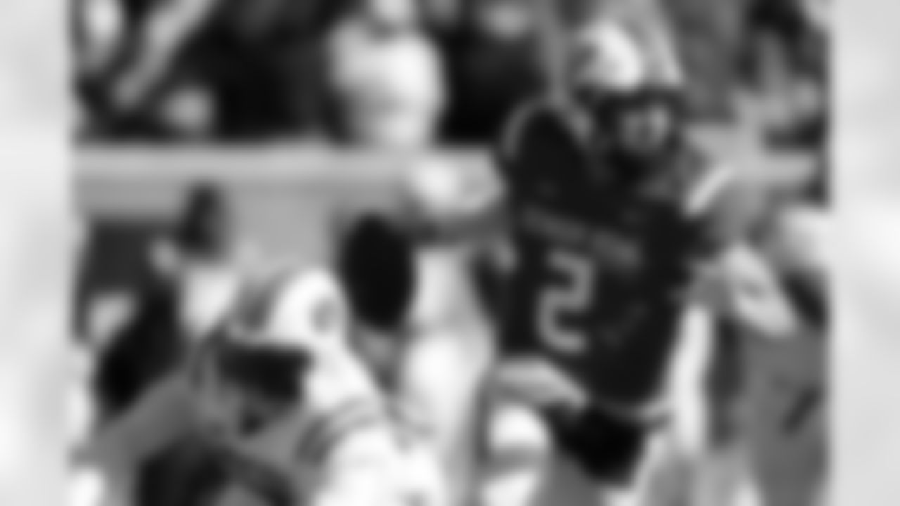 National Team quarterback Diego Pavia (2) of Vanderbilt, rolls out to pass during the first half of the Senior Bowl NCAA college football game Saturday, Jan. 31, 2026, in Mobile, Ala. (AP Photo/Butch Dill)