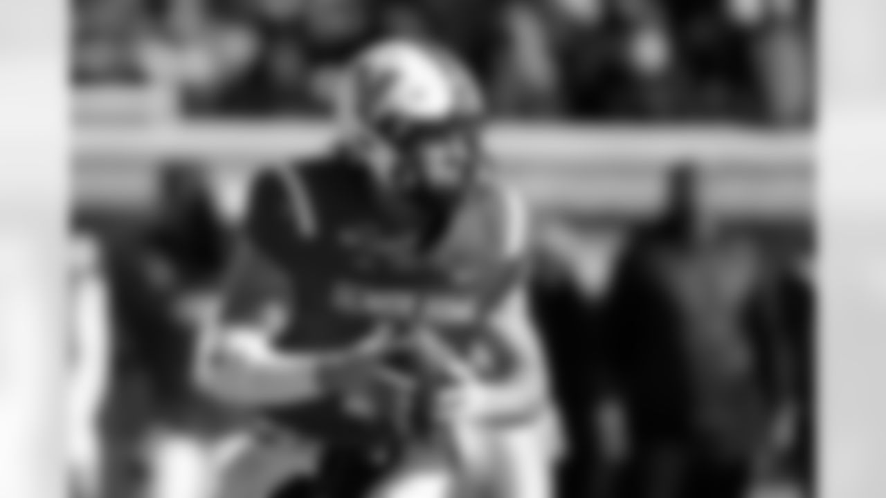 National Team quarterback Diego Pavia (2), of Vanderbilt, rolls out to pass during the first half of the Senior Bowl NCAA college football game Saturday, Jan. 31, 2026, in Mobile, Ala. (AP Photo/Butch Dill)