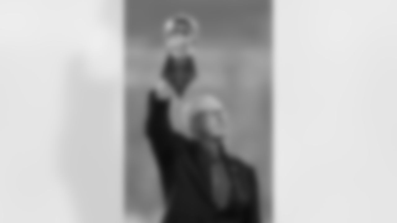 Former New York Giants head coach Tom Coughlin holds up the Super Bowl Trophy during a halftime anniversary ceremony celebrating the Giants win in Super Bowl XLII during the 2017 NFL week 2 regular season football game against the against the Detroit Lions, Monday, Sept. 18, 2017 in East Rutherford, N.J. (Paul Spinelli via AP)