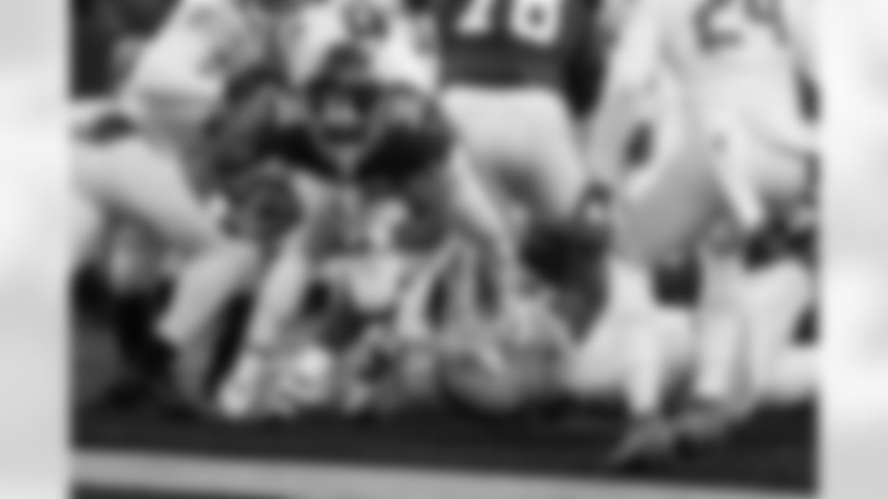 New York Giants running back Matt Breida (31) dives in for a touchdown against Detroit Lions linebacker Austin Bryant (2) during the second half of an NFL football game, Sunday, Nov. 20, 2022, in East Rutherford, N.J. (AP Photo/John Munson)