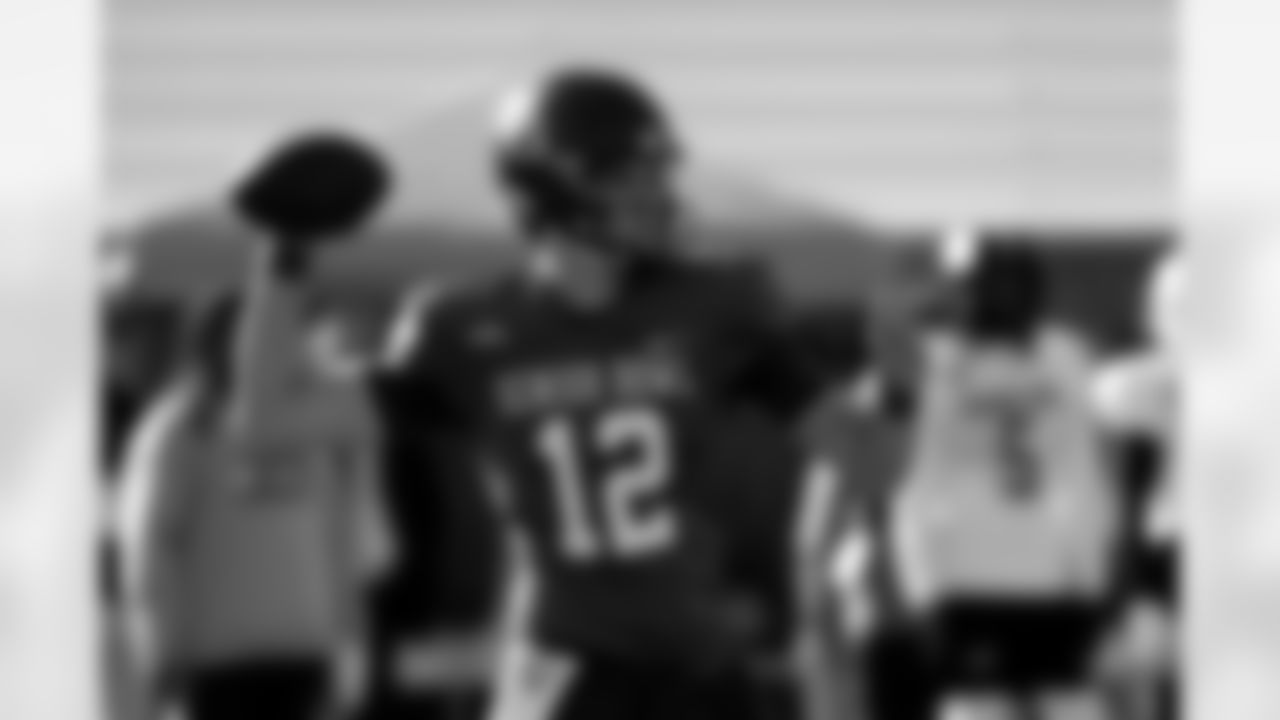 National Team quarterback Sawyer Robertson (12), of Baylor runs through drills during practice for the Senior Bowl NCAA college football game Tuesday, Jan. 27, 2026, in Mobile, Ala. (AP Photo/Butch Dill)