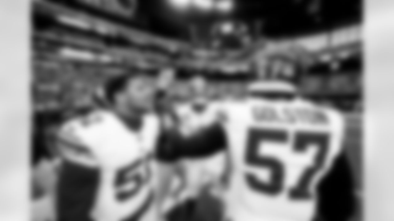 OLB Abdul Carter (51), OLB Brian Burns (0), DL Chauncey Golston (57)