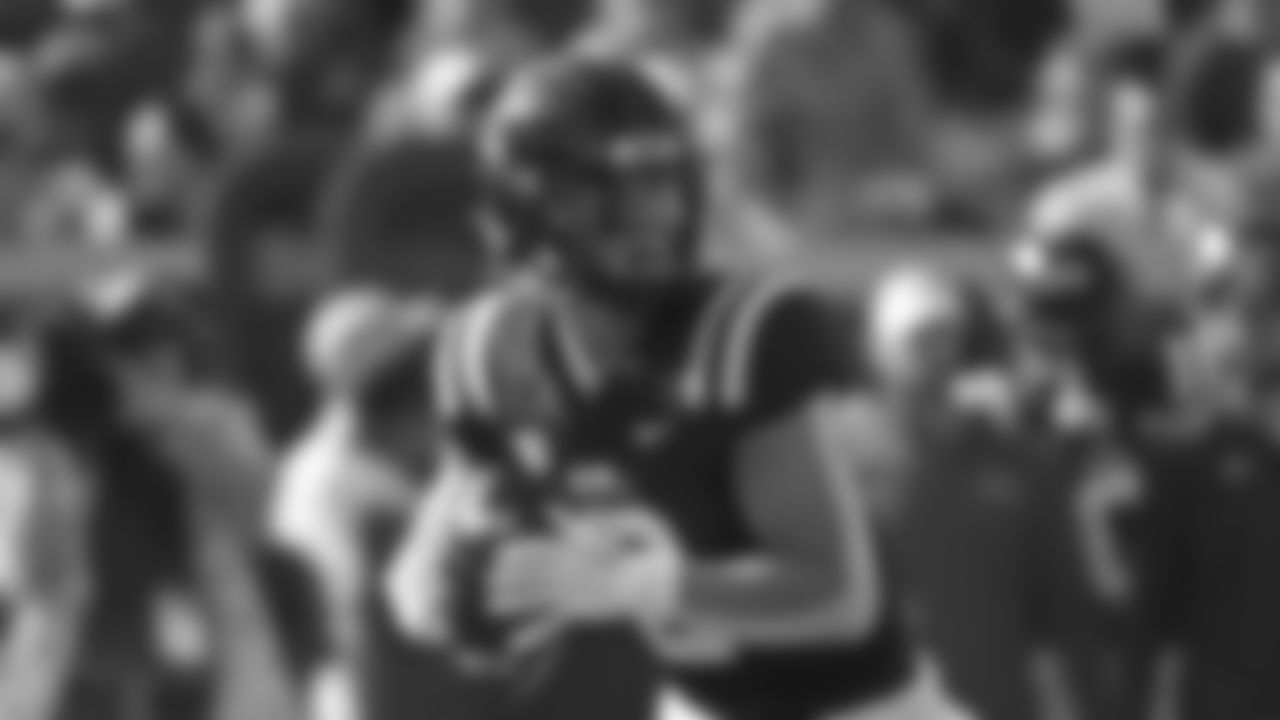Mississippi quarterback Jaxson Dart (2) looks to pass during the first half of an NCAA college football game against Tulsa in Oxford, Miss., Saturday, Sept. 24, 2022. (AP Photo/Thomas Graning)