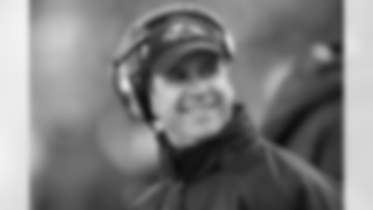 Baltimore Ravens coach John Harbaugh smiles during an NFL wild-card playoff football game in Foxborough, Mass., Sunday, Jan. 10, 2010. (AP Photo/Winslow Townson)