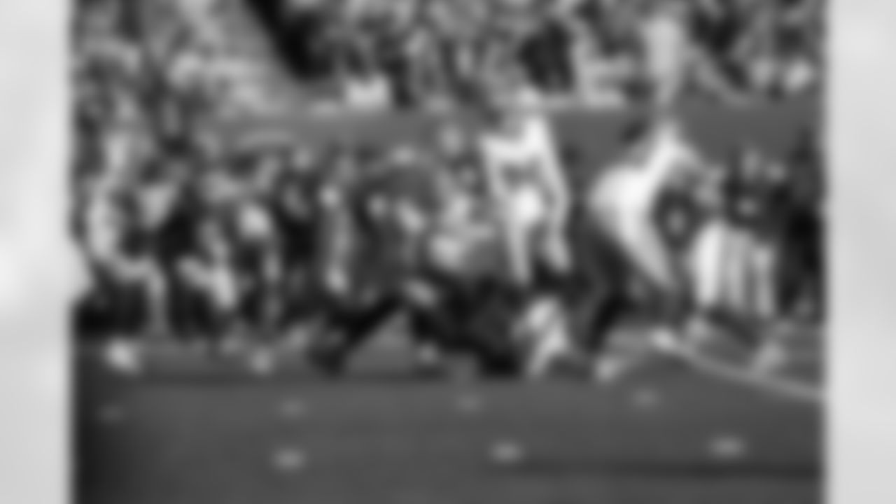 DT Darius Alexander (91), LB Demetrius Flannigan-Fowles (33)