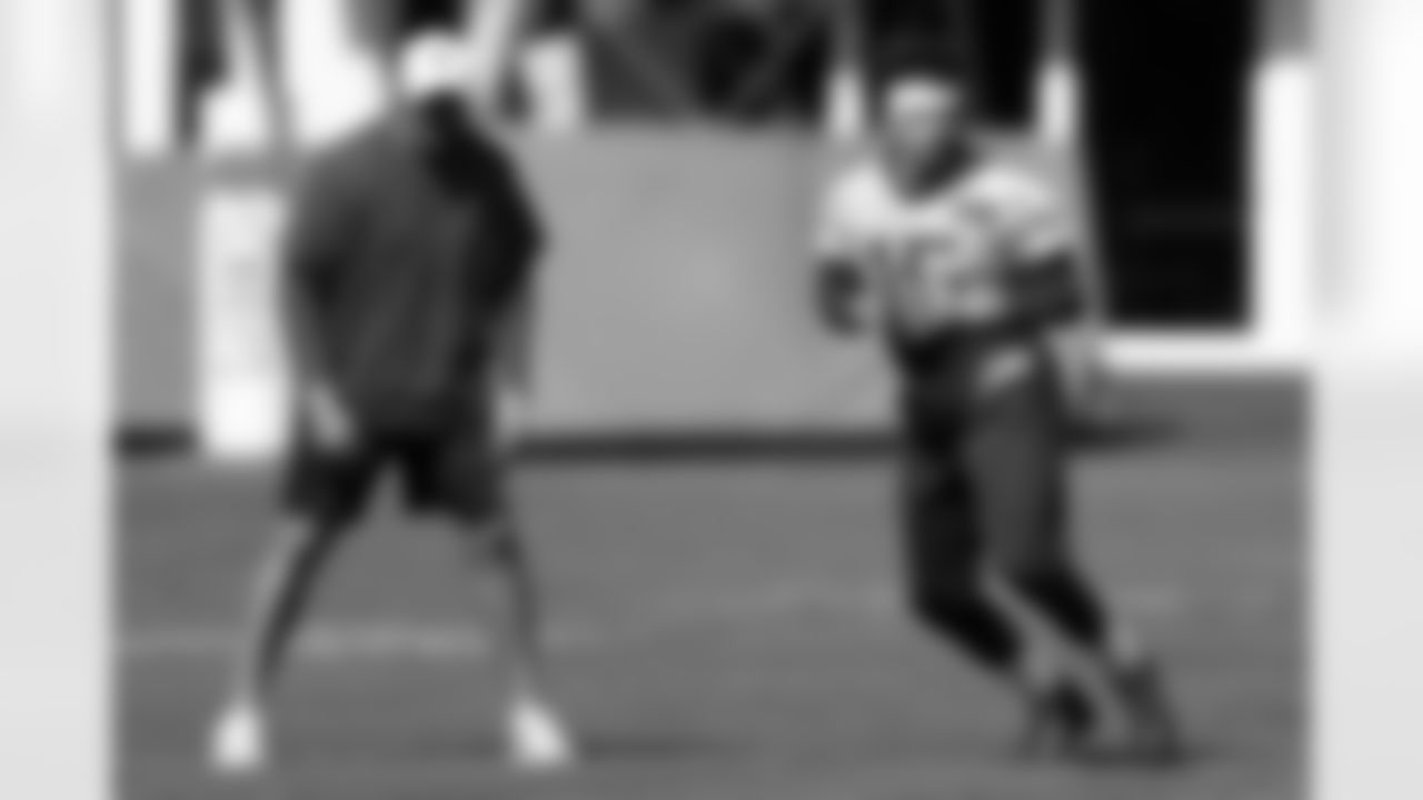 Kansas City Chiefs quarterback Patrick Mahomes (15) runs drills with coach Mike Kafka during practice on Wednesday, Jan. 29, 2020, in Davie, Fla., for the NFL Super Bowl 54 football game. (AP Photo/Brynn Anderson)