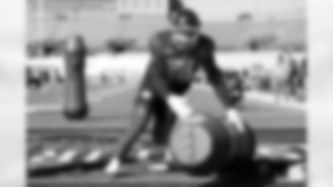 National Team defensive end Logan Fano (50), of Utah, runs through drills during practice for the Senior Bowl NCAA college football game Tuesday, Jan. 27, 2026, in Mobile, Ala. (AP Photo/Butch Dill)