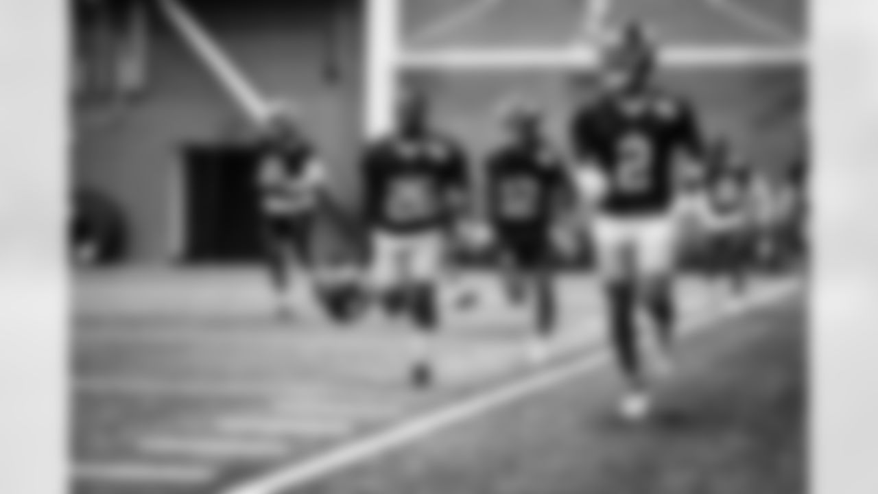 RB Devin Singletary (26) and WR Juice Wells Jr. (2)