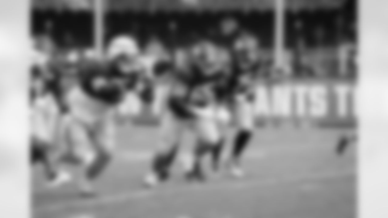 New York Giants guard Jake Kubas (63),New York Giants center Austin Schlottmann (65),New York Giants guard Joshua Ezeudu (75)