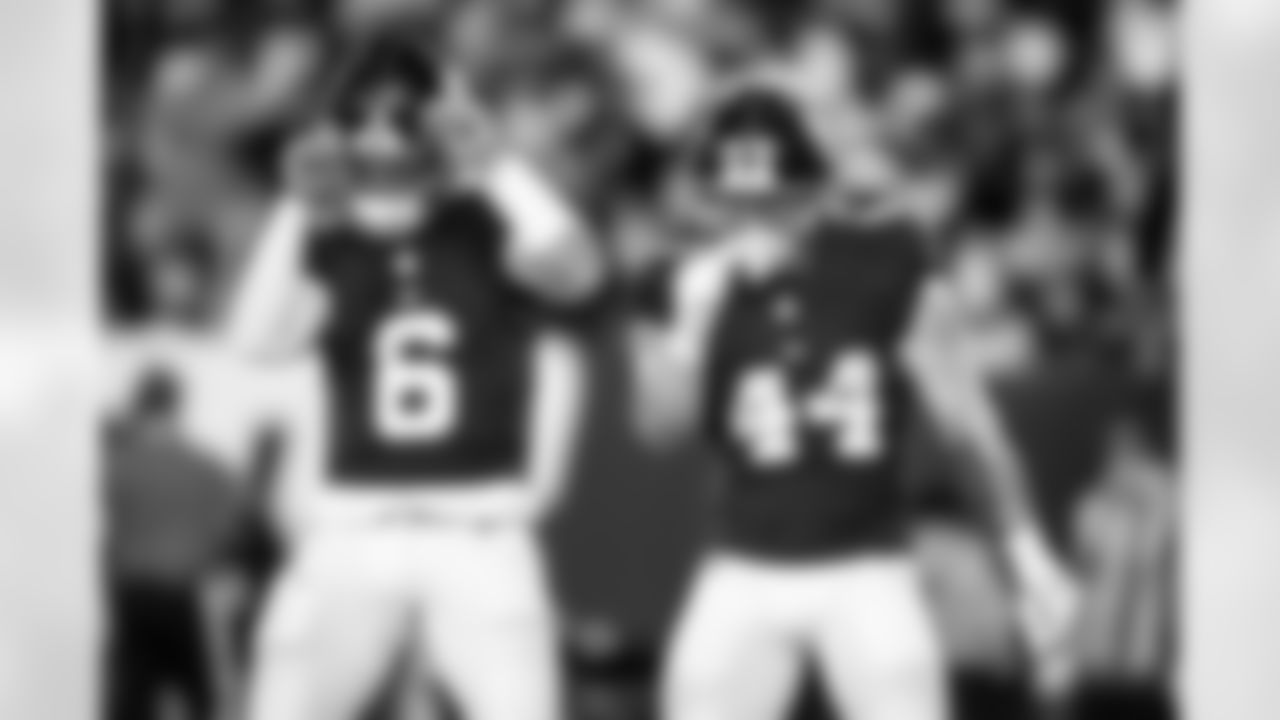 QB Jaxson Dart (6), RB Cam Skattebo (44)