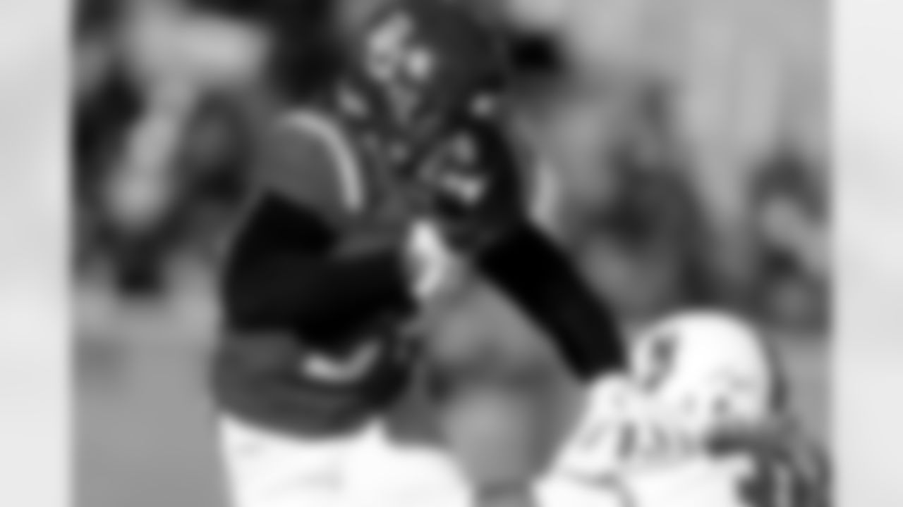 National Team wide receiver Josh Cameron (34), of Baylor caries the ball during the second half of the Senior Bowl NCAA college football game Saturday, Jan. 31, 2026, in Mobile, Ala. (AP Photo/Butch Dill)