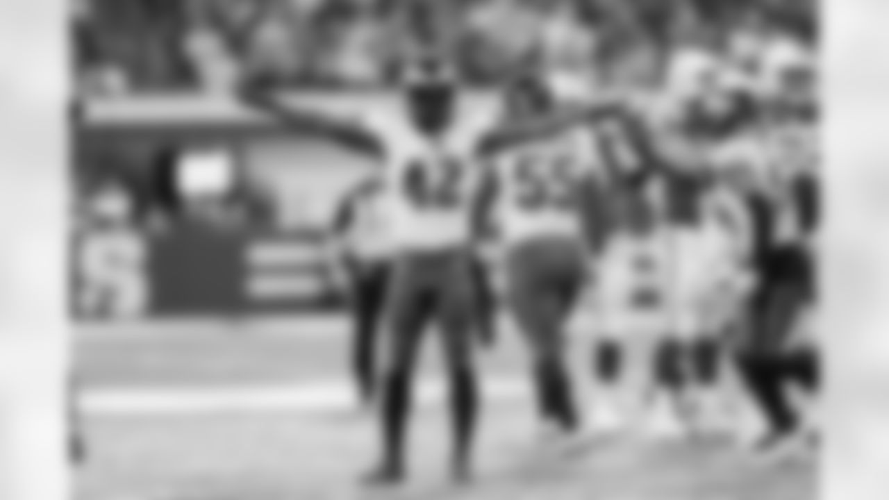 Philadelphia Eagles safety K'Von Wallace (42) signals a missed field goal by the Indianapolis Colts during a NFL football game Sunday, Nov. 20, 2022 in Indianapolis. The Eagles defeated the Colts 17-16. (G. Newman Lowrance via AP)