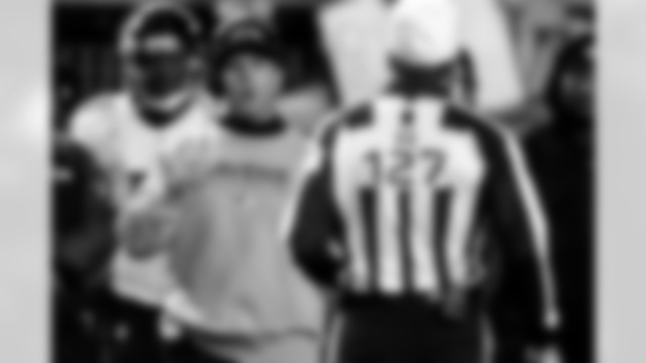 Baltimore Ravens head coach John Harbaugh, left, talks with referee Bill Leavy (127) during the fourth quarter of an NFL football game against the Pittsburgh Steelers in Pittsburgh on Sunday, Oct. 20, 2013. The Steelers won 19-16. (AP Photo/Gene J. Puskar)