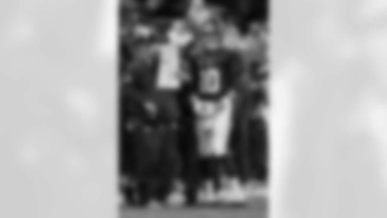 New York Giants quarterback Eli Manning (10) gets the play call from head coach Ben McAdoo during a week 15 NFL football game against the Detroit Lions on December 18, 2016 in East Rutherford, NJ. (Evan Pinkus via AP)