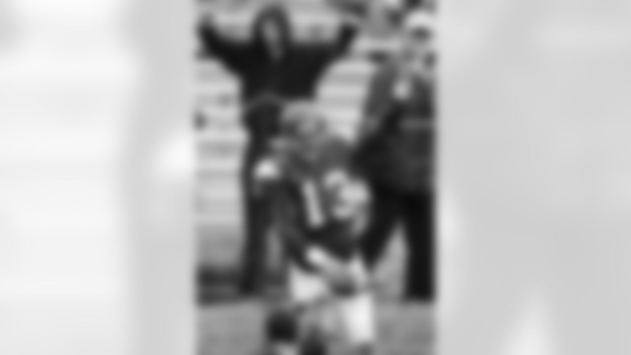 Northwestern quarterback Mike Kafka (13) celebrates after his first touchdown against Miami (Ohio) during the first quarter of an NCAA college football game in Evanston, Ill., Saturday, Oct. 10, 2009. Northwestern won 16-6.(AP Photo/Nam Y. Huh)