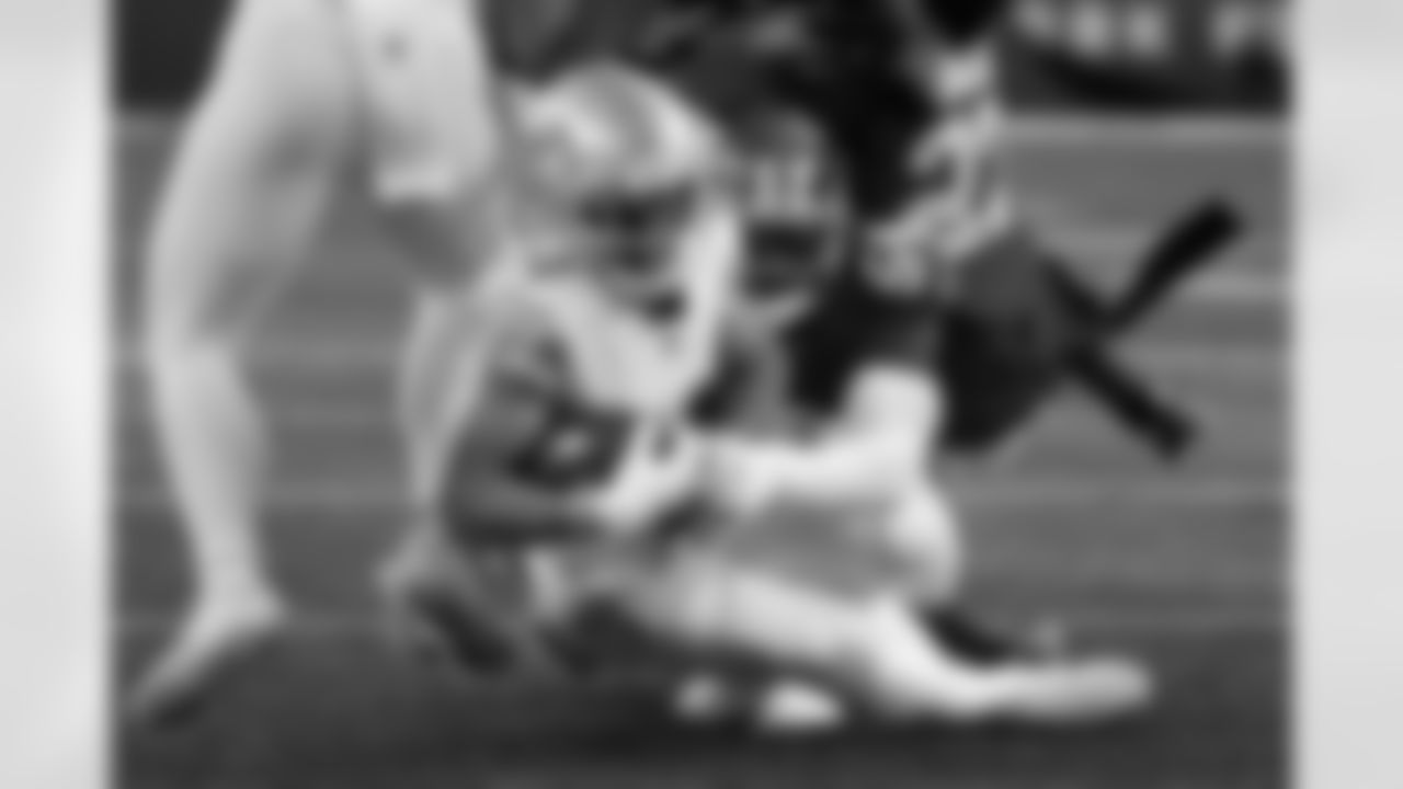 Detroit Lions wide receiver Amon-Ra St. Brown (14) runs the ball against New York Giants linebacker Jaylon Smith (54) during the second half of an NFL football game, Sunday, Nov. 20, 2022, in East Rutherford, N.J. (AP Photo/Seth Wenig)