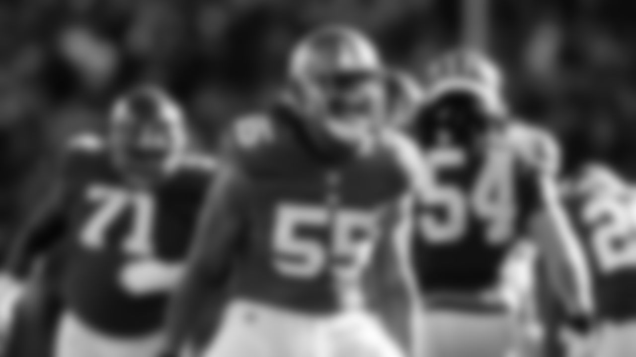 New York Giants linebacker Jihad Ward (55) reacts after making a stop during the first half of an NFL football game against the Detroit Lions, Sunday, Nov. 20, 2022, in East Rutherford, N.J. (AP Photo/John Munson)