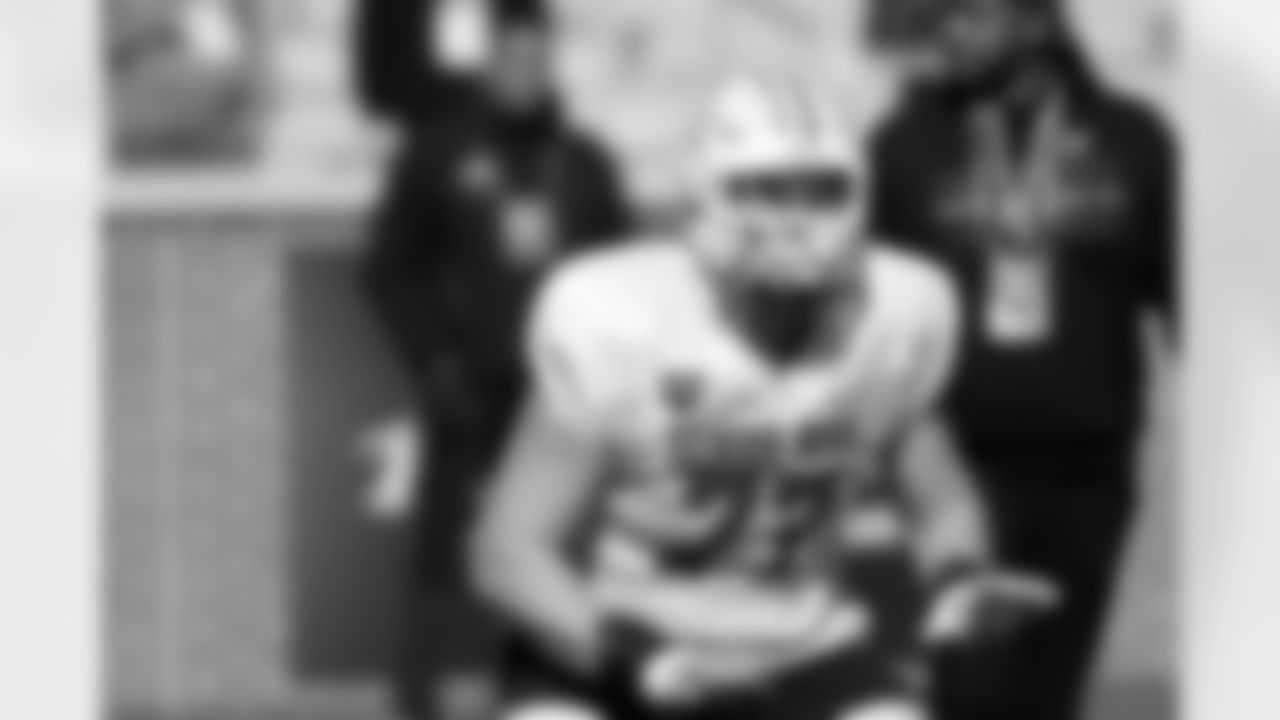 National Team offensive lineman Keylan Rutledge (77), of Georgia Tech, runs through drills during practice for the Senior Bowl NCAA college football game Tuesday, Jan. 27, 2026, in Mobile, Ala. (AP Photo/Butch Dill)