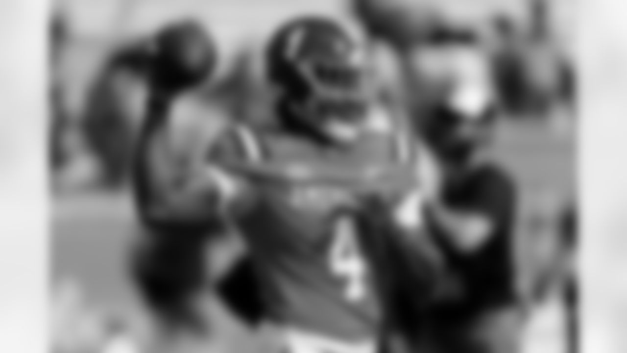 American team quarterback Jalen Milroe (4), of Alabama, warms up before the Senior Bowl NCAA college football game, Saturday, Feb. 1, 2025, in Mobile, Ala. (AP Photo/Butch Dill)