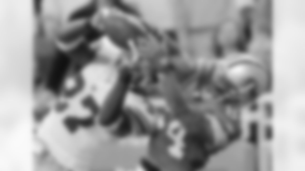 New York Giants safety James Butler (37) intercepts a pass intended for Detroit Lions wide receiver Shaun McDonald (84) late in the fourth quarter of a football game Sunday, Nov. 18, 2007, in Detroit. The Giants beat the Lions, 16-10. (AP Photo/Duane Burleson)