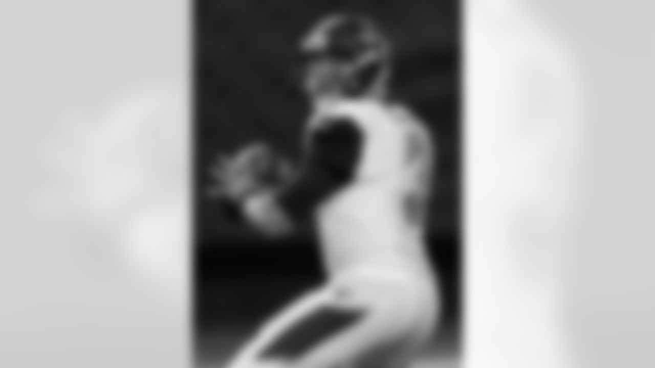 Jacksonville Jaguars quarterback Mike Kafka (3) works against the Atlanta Falcons during the second half of a preseason NFL football game, Thursday, Aug. 29, 2013, in Atlanta. (AP Photo/Dave Martin)