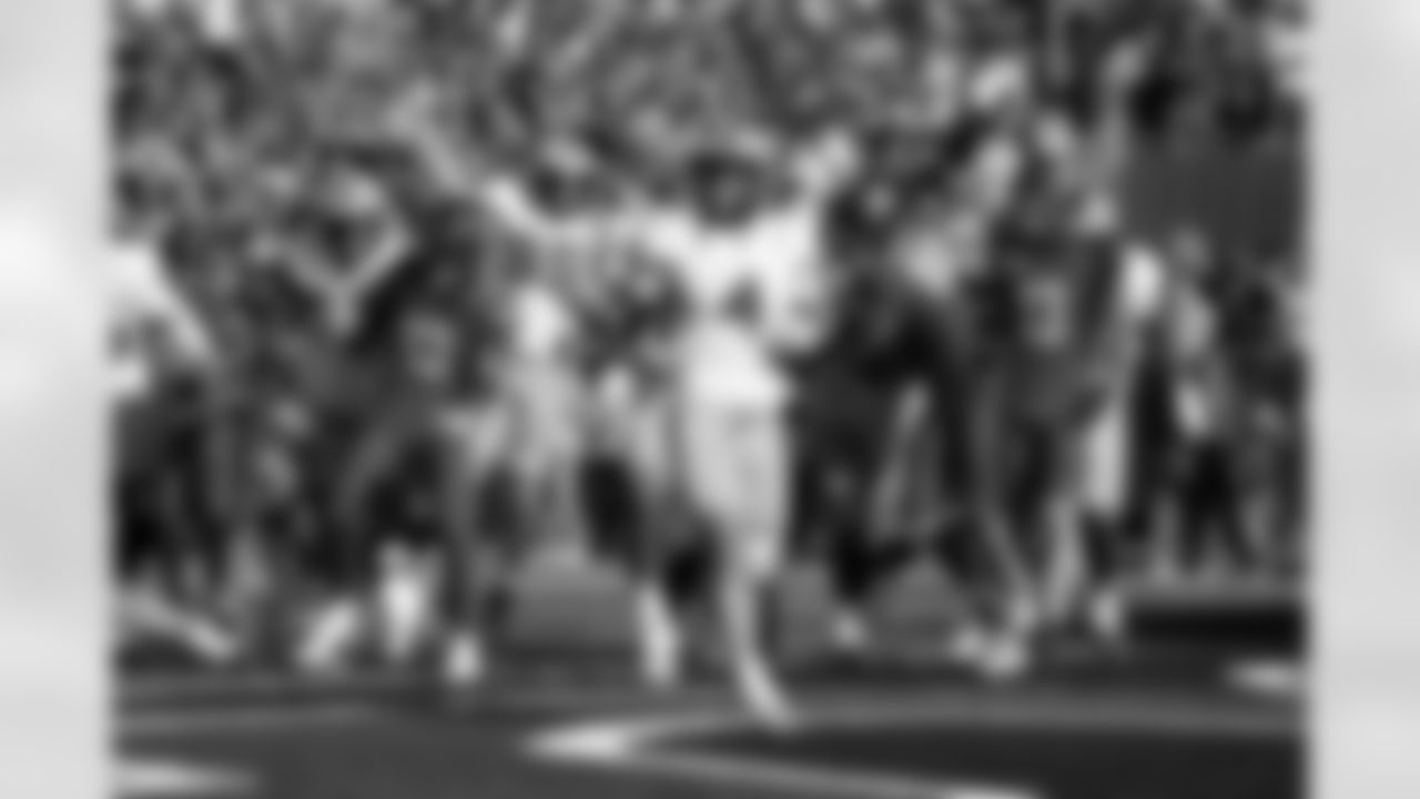 Arizona State running back Cam Skattebo (4) scores a touchdown during the first half of an NCAA college football game against Arizona, Saturday, Nov. 30, 2024, in Tucson, Ariz. (AP Photo/Samantha Chow)
