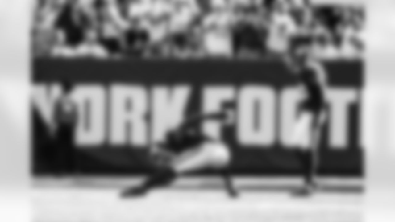 OLB Brian Burns (0) , LB Demetrius Flannigan-Fowles (33)